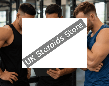 Coach explaining Testosterone and Sustanon performance categories to an athlete inside a modern strength training gym.